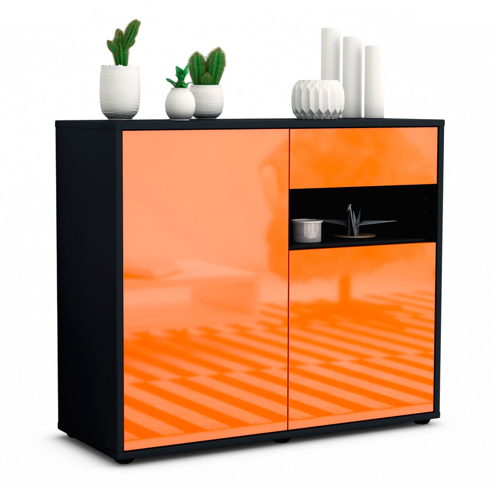 Sideboard Charlotta | | Front in Hochglanz Orange | 92x79x35cm (BxHxT) 1 Sideboard Charlotta | | Front in Hochglanz Orange | 92x79x35cm (BxHxT)